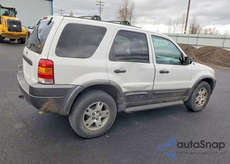2003 Ford Escape Xlt z USA, uszkodzony, nr VIN 1FMCU93163KA71377